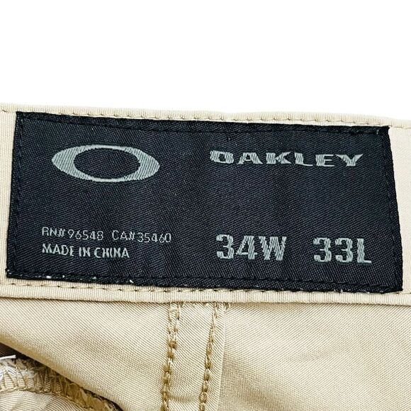 Oakley Golf Tan Flat Front Pockets Men’s Pants Sz 34x33 - Picture 10 of 12
